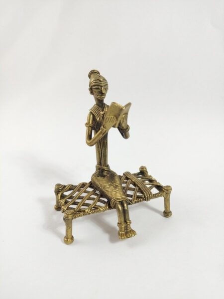 Timeless Tribal Art, Dokra metal Art, Hand-made, Collectible show-piece, Figurine of lady sitting on a Cot & Reading